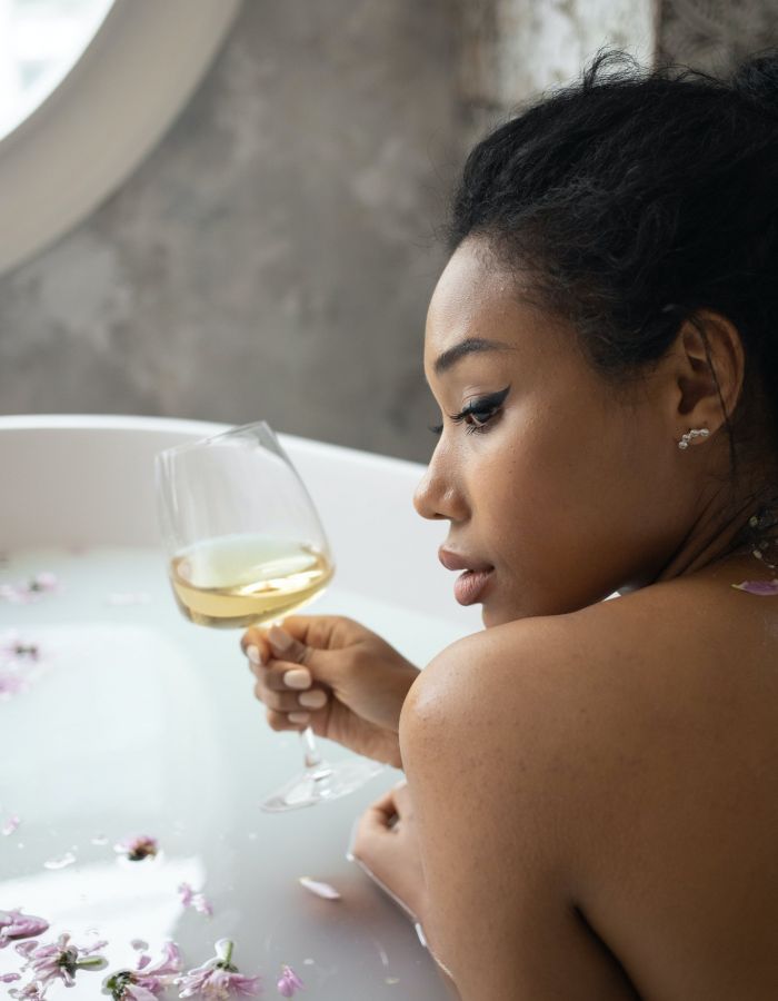 Young woman with a glass of wine