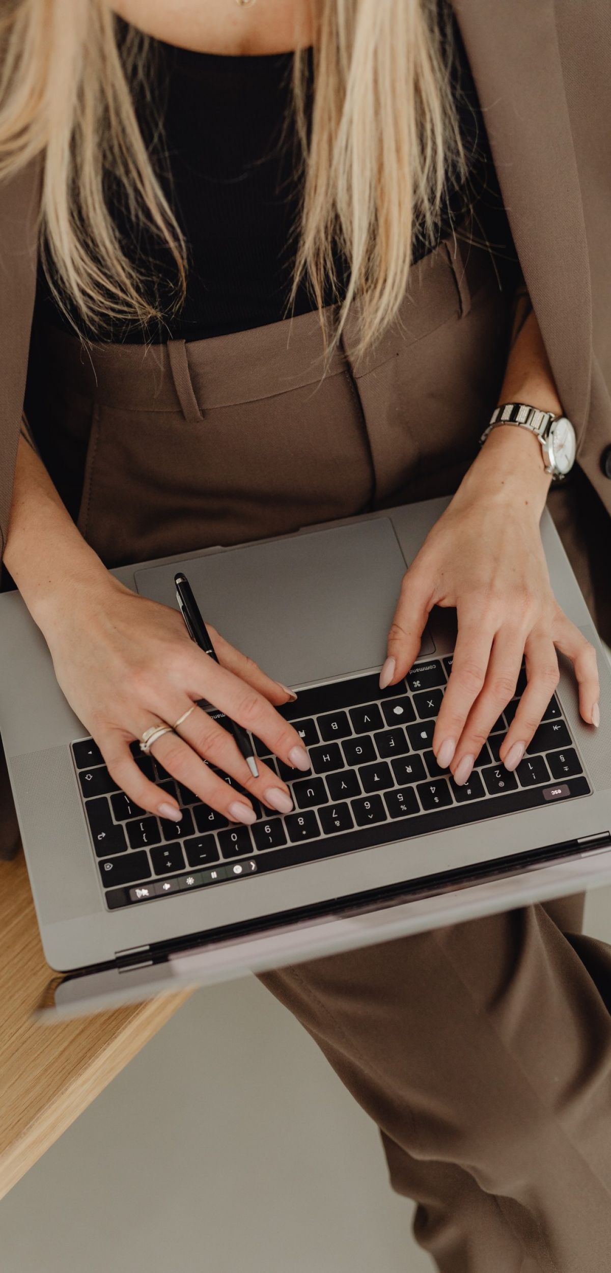 Business woman typing on a computer